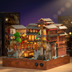 Ginzan Onsen book nook kit assembled with warm LED lighting and Japanese hot spring town